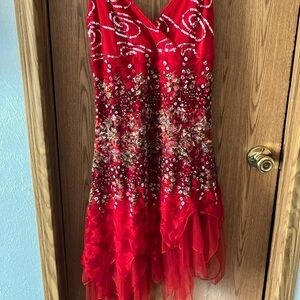 Red mid length party dress sequences on top and Tully bottom.